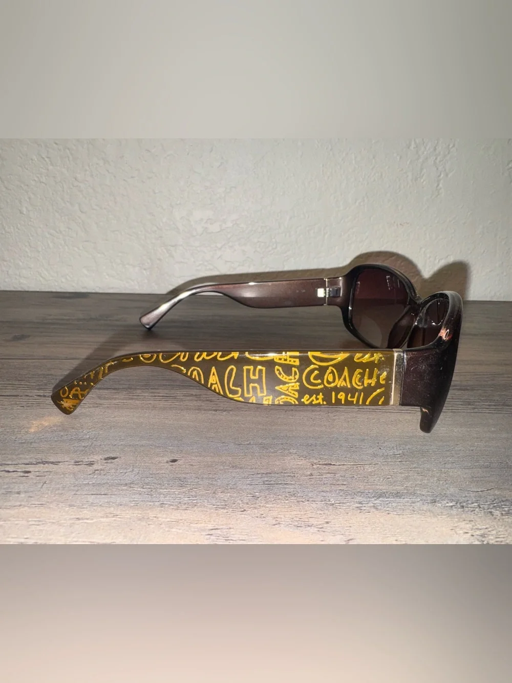 Coach Women’s Brown Sunglasses with Yellow Logo Accent